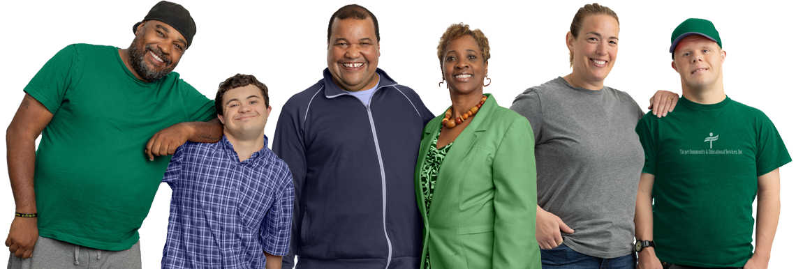 target direct support professionals stand with target community participants for a photo